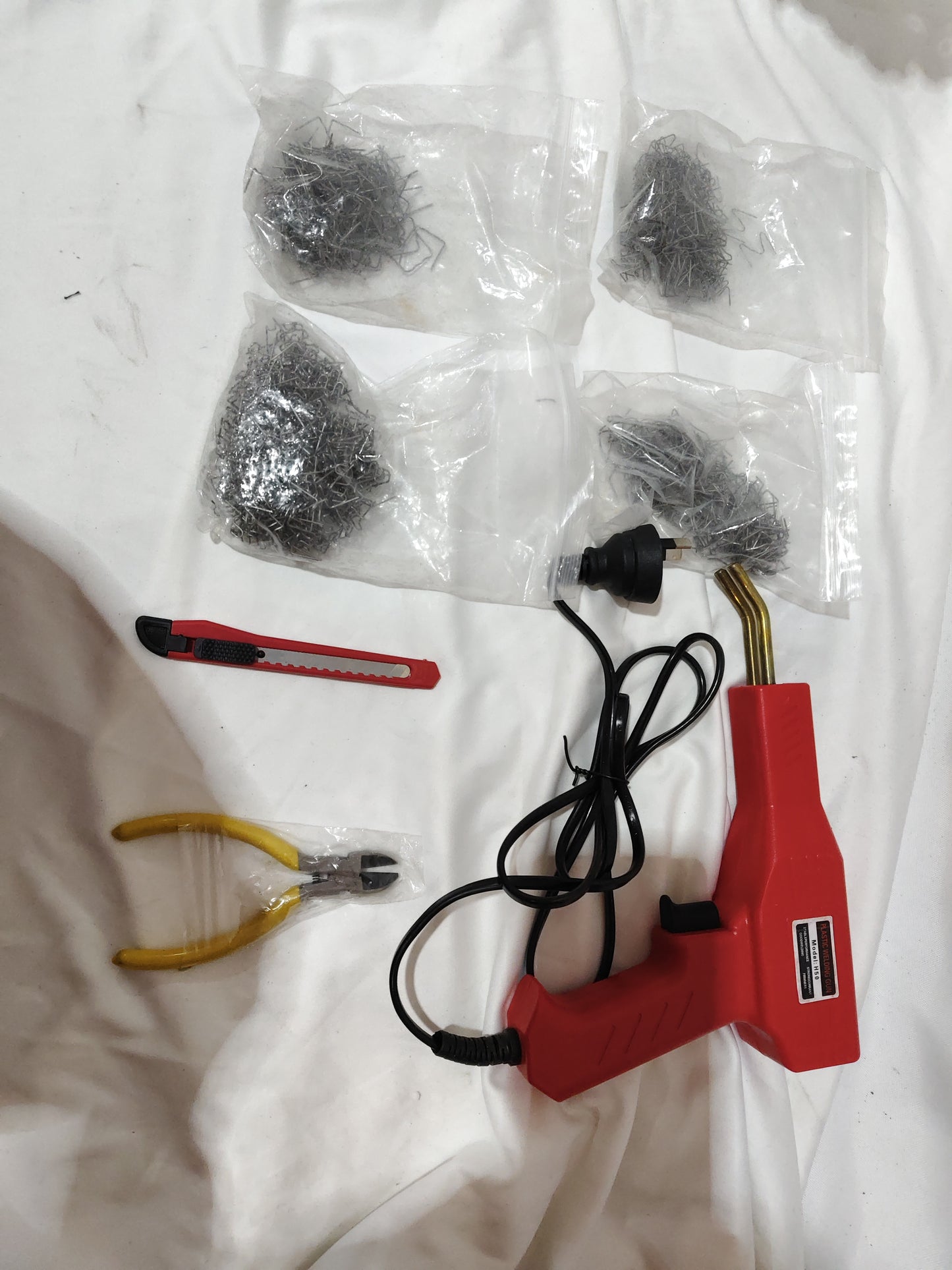 Automobile bumper repair machine